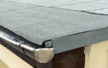repair or replace Three Oaks flat roofing?